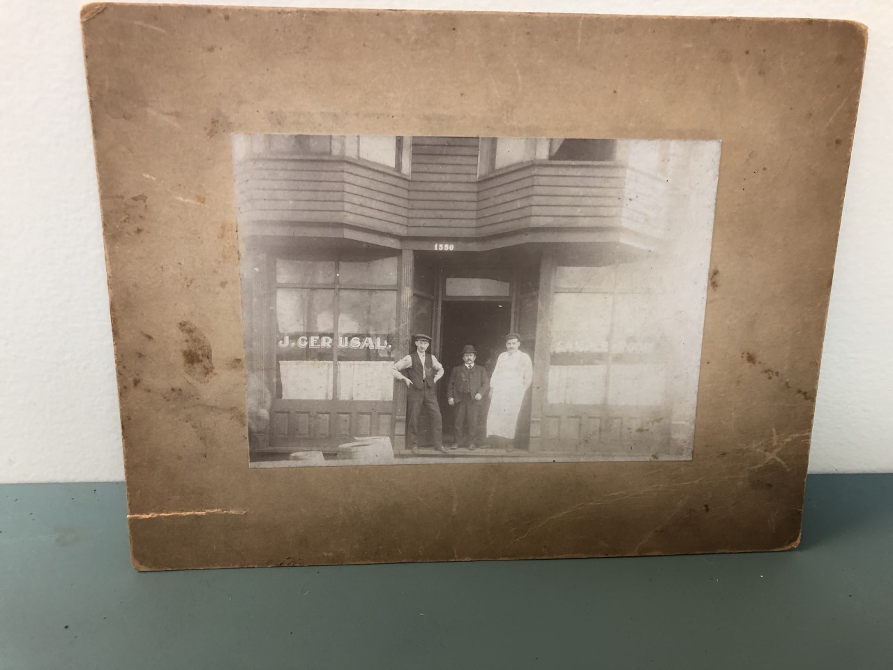 Image for Three Men at Store Front , J. Gerusal